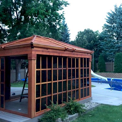 Sun Gazebo with Sliding Doors (Options: 10' L, 14' W, California Redwood, Without Skylight, No Floor, Transparent Premium Sealant). Photo Courtesy of R. Hayko of Andover, MN.