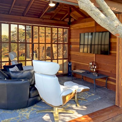 Sun Gazebo with Sliding Doors (Options: Custom Size 12' L x 10' W, California Redwood, 8 ft Wall Height, With One Solid Wall by Custom Request, Without Skylight, Complete Floor, with Metal Roof, Transparent Premium Sealant). Photo Courtesy of M. Locati of Lafayette, CA.