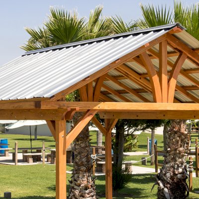 Breezy Pavilion (Options: 14' L x 12' W, Douglas-fir, 4-Post Anchor Kit for High-Wind, No Ceiling Fan Base, Vertical Decorative Trims, Transparent Premium Sealant).