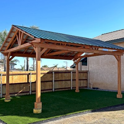 Breezy Pavilion (Options: 20' L x 15' W, Mosaic Douglas-Fir, 4-Post Anchor Kit for Concrete, No Ceiling Fan Base, No Post Decorative Trims, Transparent Premium Sealant). Photo Courtesy of B. Worley of Ramona, CA.