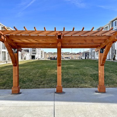 Cantilevered Pergola (Options: 8in x 8in Post Thickness, 15' Length x 8' Width, California Redwood, 7 ft Posts Height, 3-Post High-Wnd Anchor Kit, Transparent Premium Sealant). Photo Courtesy of R. Pike of Denver, CO.