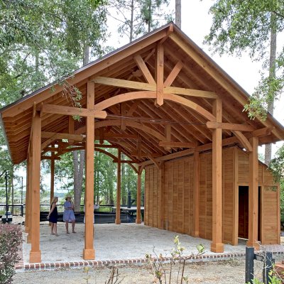 Custom Cardinal's Nest Pavilion (Options: 35' L x 26' W, Douglas-fir, 10' H Posts, 8x8 Posts, Electrical Wiring Trim Kit for 3 Posts, 12-Post Anchor Kit for High-Wind, 3 Ceiling Fan Bases, Transparent Premium Sealant) with Custom 25' x 6' Storage Shed Attached. Photo Courtesy of A. Dowd of Bluffton, South Carolina.