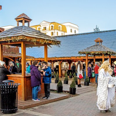 Cardinal's Nest Pavilion (Options: 80' L x 34' W, California Redwood, Transparent Premium Sealant). Pavilion Installed in Carmel, IN, for the Carmel Christkindlmarkt, Named Best Holiday Market in the Country in 2021.