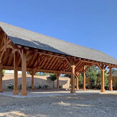 The Cardinal's Nest Pavilions (Options: 40’ L x 26’ W, Douglas-fir, 12-Post Anchor Kit for High-Wind, Electrical Wiring Trim Kit for 2 Posts, No Ceiling Fan Bases, Transparent Premium Sealant). Photo Courtesy of D. Pratchard of Santa Clarita.