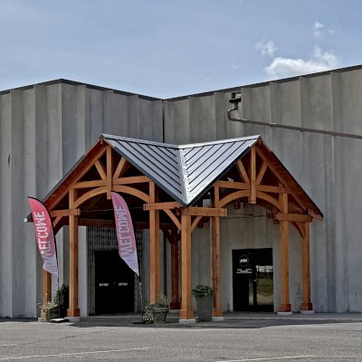 Custom Cardinal's Nest Pavilion (Options: 21' L x 21' W, Douglas-fir, No Ceiling Fan Bases, 11' H Posts, No Post Decorative Trims, Post Anchor Kit for High-Wind, Transparent Premium Sealant). Photo Courtesy of Harvest Outreach Church, in 1155 21st Ave North, Wahpeton, ND 58075.
