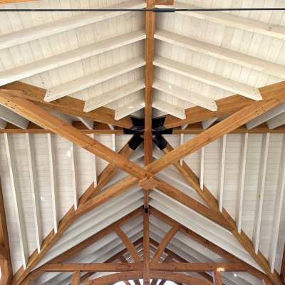 Custom Cardinal's Nest Pavilion (Options: 74' x 74', Douglas-fir, 20-Post Anchor Kit for High-Wind, 10' H Posts, Horizontal Decorative Trims for All Posts, with 5 Ceiling Fan Bases, Transparent Premium Sealant, White Wash for Ceiling). Photo Courtesy of J. Fookes of Elk Creek, CA.