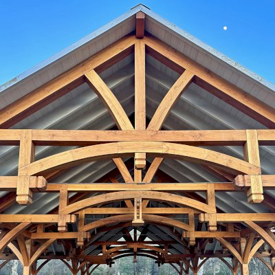 Custom Cardinal's Nest Pavilion (Options: 74' x 74', Douglas-fir, 20-Post Anchor Kit for High-Wind, 10' H Posts, Horizontal Decorative Trims for All Posts, with 5 Ceiling Fan Bases, Transparent Premium Sealant, White Wash for Ceiling). Photo Courtesy of J. Fookes of Elk Creek, CA.