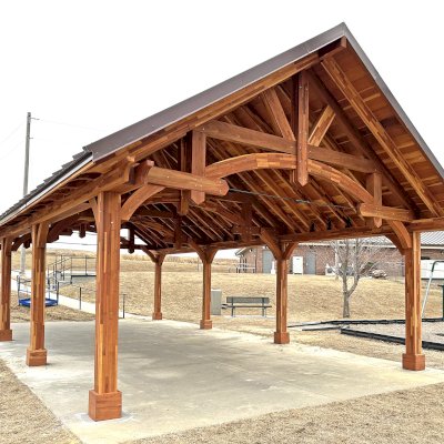 Custom Cardinal's Nest Pavilions (Options: 40’ L x 20’ W, Mosaic Redwood, 8-Post Anchor Kit for High-Wind, Electrical Wiring Trim Kit for 4 Posts, No Ceiling Fan Bases, Transparent Premium Sealant). Photo Courtesy of White Cloud Health Center of White Cloud, Kansas.