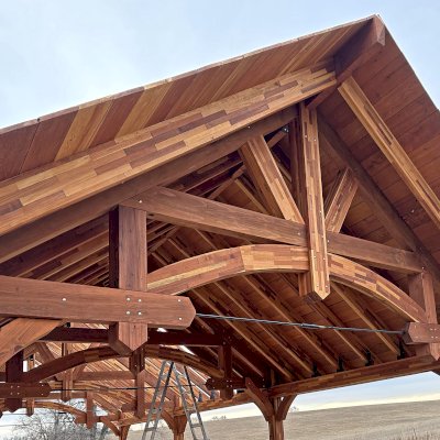Custom Cardinal's Nest Pavilion Under Construction (Options: 40’ L x 20’ W, Mosaic Redwood, 8-Post Anchor Kit for High-Wind, Electrical Wiring Trim Kit for 4 Posts, No Ceiling Fan Bases, Transparent Premium Sealant). Photo Courtesy of White Cloud Health Center of White Cloud, Kansas.
