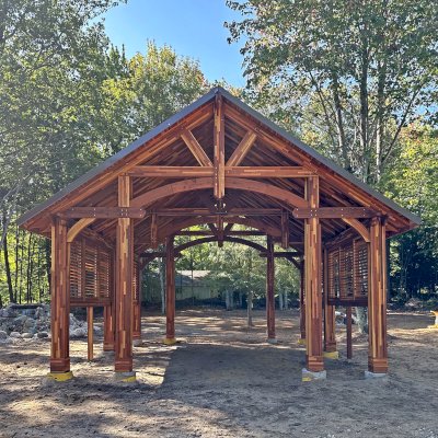 Cardinal's Nest Pavilion (Options: 26' L x 22' W, Mosaic Redwood, 2 Ceiling Fan Bases, 10' H Posts, with Vertical Post Decorative Trims, 2 Shutter Privacy Panels Half Height without Wall, with Fascia Boards, Post Anchor Kit for High-Wind, Transparent Premium Sealant). Photo Courtesy of K. Kolcuski of Petoskey, MI.