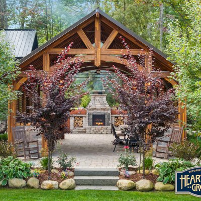 Cardinal's Nest Pavilions (Options: 26’ L x 22’ W, Mosaic Redwood, Post Anchor Kit for High-Wind, 2 Shutter Privacy Panels Half Height Without Wall, Vertical Post Decorative Trims, 10' H Posts, 2 Ceiling Fan Bases, Transparent Premium Sealant). Photo Courtesy of at Hearthside Grove Motorcoach Resort, 4978 Monarch way, Petoskey, MI 49770. 