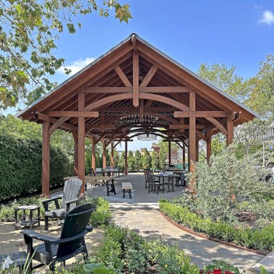 Custom Cardinal's Nest Pavilion (Options: 50' L x 24' W, Douglas-fir, 2 Ceiling Fan Bases, Post Anchor Kit for High-Wind, Electrical Wiring Trim Kit for 6 Posts, Coffee Stain Premium Sealant). Photo Courtesy of M. Pannek of Lake Forest, CA.