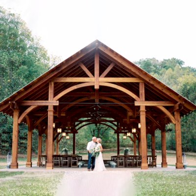 Cardinal's Nest Pavilions (Options: 60’ L x 34’ W, California Redwood, 16-Post Anchor Kit for High Wind, Electrical Wiring Trim Kit for 6 Posts, and 6 Cutouts for Outlets, 2 Ceiling Fan Bases and at least 4 cutouts for Electrical Boxes, Transparent Premium Sealant), Photo Courtesy of S. Hilton of Sevierville, TN.