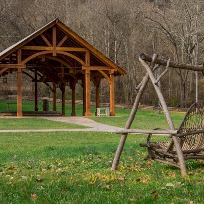 Cardinal's Nest Pavilions (Options: 60’ L x 34’ W, California Redwood, 16-Post Anchor Kit for High-Wind, Electrical Wiring Trim Kit for 6 Posts, and 6 Cutouts for Outlets, 2 Ceiling Fan Bases and at least 4 cutouts for Electrical Boxes, Transparent Premium Sealant), Photo Courtesy of S. Hilton of Sevierville, TN.