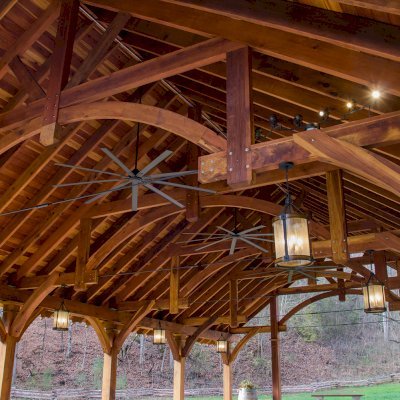 Cardinal's Nest Pavilions (Options: 60’ L x 34’ W, California Redwood, 16-Post Anchor Kit for High-Wind, Electrical Wiring Trim Kit for 6 Posts, and 6 Cutouts for Outlets, 2 Ceiling Fan Bases and at least 4 cutouts for Electrical Boxes, Transparent Premium Sealant), Photo Courtesy of S. Hilton of Sevierville, TN.
