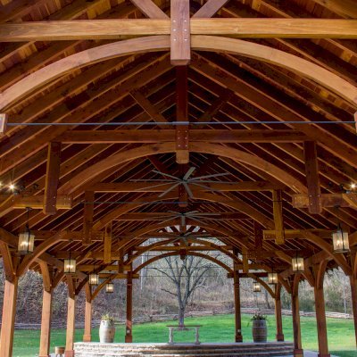 Cardinal's Nest Pavilions (Options: 60’ L x 34’ W, California Redwood, 16-Post Anchor Kit for High-Wind, Electrical Wiring Trim Kit for 6 Posts, and 6 Cutouts for Outlets, 2 Ceiling Fan Bases and at least 4 cutouts for Electrical Boxes, Transparent Premium Sealant), Photo Courtesy of S. Hilton of Sevierville, TN.