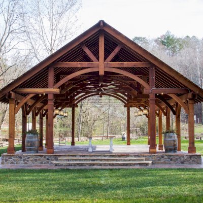 Cardinal's Nest Pavilions (Options: 60’ L x 34’ W, California Redwood, 16-Post Anchor Kit for High-Wind, Electrical Wiring Trim Kit for 6 Posts, and 6 Cutouts for Outlets, 2 Ceiling Fan Bases and at least 4 cutouts for Electrical Boxes, Transparent Premium Sealant), Photo Courtesy of S. Hilton of Sevierville, TN.