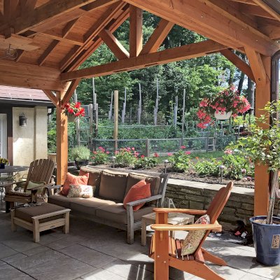 Classic Adirondack Chairs (Options: California Redwood, No Cushion, No Ottoman, Transparent Premium Sealant). Forever Redwood's Adirondack chair is shown towards the front. The Adirondack chair towards the rear is not from Forever Redwood. Photo Courtesy of G. Matusky of Ardmore, Pennsylvania.