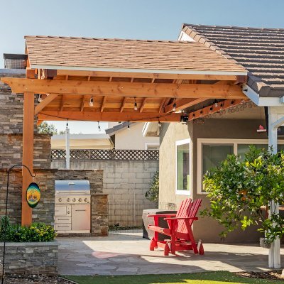Del Norte Porch Pavilion (Options: 12' L x 16' W, Douglas-fir, 2-Post Anchor Kit for Concrete, No Ceiling Fan Base, No Electrical Wiring Trim Kit, No Post Decorative Trims, Transparent Premium Sealant). Photo Courtesy of J. Clark of San Diego, CA.