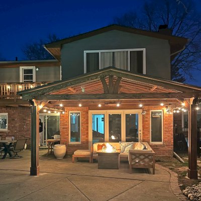 Forever Porch Pavilion (Options: 18' L x 12' W, Douglas-fir, 2-Post Anchor Kit for High-Wind, No Electrical Wiring Trim, 8.5 ft Posts Height, Vertical Post Decorative Trims, No Ceiling Fan Base, No Curtain Rods, No Privacy Panels, Transparent Premium Sealant). Photo Taken 1 Year After Installation. Photo Courtesy of C. Mellanby of West Bloomfield, Michigan.