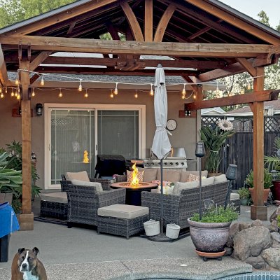 Custom Del Norte Porch Pavilion (Options: 14' L x 16' W, California Redwood, 2-Post Anchor Kit for Concrete, 10.5' H Posts, 1 Ceiling Fan Base, No Electrical Wiring Trim Kit, No Post Decorative Trims, Transparent Premium Sealant). Photo Taken 2 Years After Installation. Photo Courtesy of R. Dakin of Vacaville, CA.