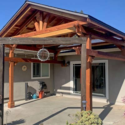 Custom Del Norte Porch Pavilion (Options: 14' L x 16' W, California Redwood, 2-Post Anchor Kit for Concrete, 10.5' H Posts, 1 Ceiling Fan Base, No Electrical Wiring Trim Kit, No Post Decorative Trims, Transparent Premium Sealant). Photo Courtesy of R. Dakin of Vacaville, CA.