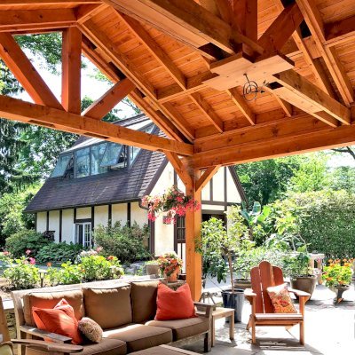 Del Norte Porch Pavilion (Options: 17' L x 18' W, Douglas-fir, 2-Post Anchor Kit for High-Wind, 1 Ceiling Fan Base, Straight Internal Truss Supports by Custom Request, 1 Electrical Wiring Trim Kit, No Post Decorative Trims, Transparent Premium Sealant).