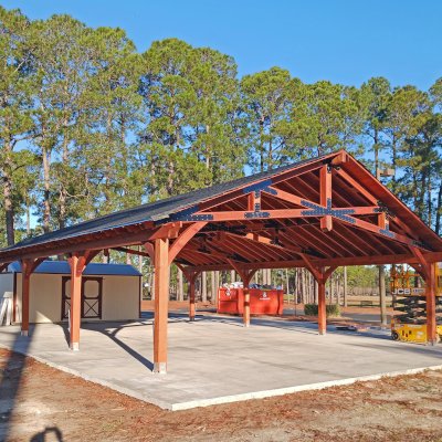 Esther Scissor Truss Pavilion (Options: 45’ L x 35’ W, California Redwood, Standard 3/4" T&G Roof Boards, 10' H Posts, with 3 Ceiling Fan Bases, 8 High-Wind Post Anchors, Transparent Premium Sealant). Photo Courtesy of F. Parini of Myrtle Beach, South Carolina.