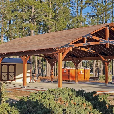 Esther Scissor Truss Pavilion (Options: 45’ L x 35’ W, California Redwood, Standard 3/4" T&G Roof Boards, 10' H Posts, with 3 Ceiling Fan Bases, 8 High-Wind Post Anchors, Transparent Premium Sealant). Photo Courtesy of F. Parini of Myrtle Beach, South Carolina.