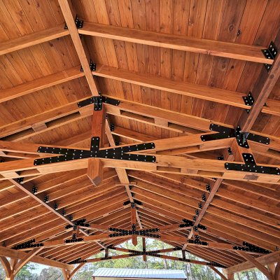 Esther Scissor Truss Pavilion (Options: 45’ L x 35’ W, California Redwood, Standard 3/4" T&G Roof Boards, 10' H Posts, with 3 Ceiling Fan Bases, 8 High-Wind Post Anchors, Transparent Premium Sealant). Photo Courtesy of F. Parini of Myrtle Beach, South Carolina.