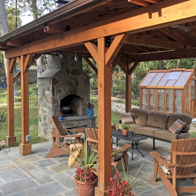The Forever Hot House (Options: 8 ft L x 6 ft W, California Redwood, 2 shelves long, Transparent Premium Sealant). Photo Also Shows a Del Norte Outdoor Kitchen Pavilion Kit. 