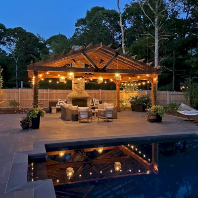 Gable Pergola (Options: 24' L x 20' W, No Wall Privacy Panel, California Redwood, No Fascia Board for Gutters, 10ft Post Height, 3 Electrical Wiring Trim Kit, No Post Decorative Trims, 6-Post Kit for High-Wind, 1 Ceiling Fan Base, No Curtain Rods, Transparent Premium Sealant). Photo Courtesy of J. Jonsson of Osterville, MA.