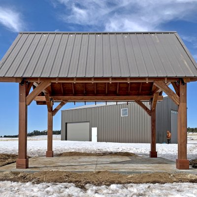 Gothic Pavilion  (Options: 18' L x 14' W, Mature Redwood, 8x8 Posts, 4-Post Anchor Kit for High-Wind, No Electrical Wiring Trims, No Fan Base, Coffee-Stain Premium Sealant). Photo Courtesy of G. Szarameta of Flagstaff, AZ.