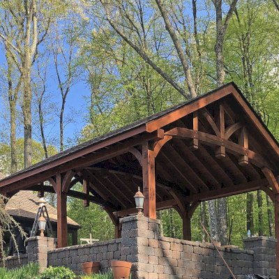 Granada Pavilion (Options: 8in x 8in Post Thickness, 24' L x 18' W, No Privacy Panels, Mature Redwood, with Fascia Boards, 9.5 ft Post Height, Electrical Wiring Trim for 2 Posts, No Post Decorative Trim, 6-Post Anchor Kit for High-Wind, No Ceiling Fan Base, No Curtain Rods, Transparent Premium Sealant). Photo Courtesy of A. Czysz of New Tripoli, Pennsylvania.