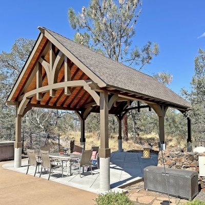 Custom Granada Pavilion (Options: 30’ L x 20’ W, Mosaic Douglas-Fir, Increased Roof Pitch From 7/12 to 10/12 by Custom Request, Post Anchor Kit for High Wind, No Electrical Wiring Trim Kit, 2 Ceiling Fan Bases, Custom Finish [Transparent Premium Sealant for Roof Boards]), Photo Courtesy of K. Kremer of Chico, CA.