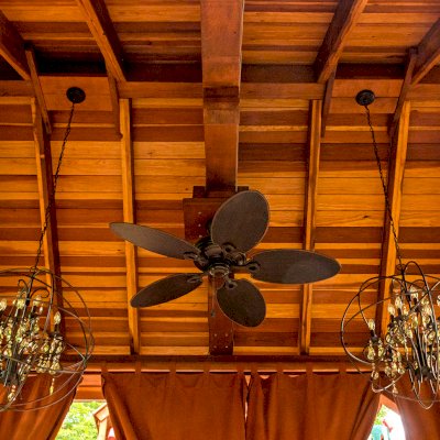 Granada Pavilion (Options: 6in x 6in post thickness, 18' L x 15' W, No Privacy Panels, California Redwood, No Fascia Board for Gutters, 10.5ft Post Height, 1 Electrical Wiring Trim, No Post Decorative Trim, 4-Post Anchor Kit for High-Wind, 3 Ceiling Fan Bases (CUSTOM REQUEST), 4 Heavy Duty Curtain Rods & Stainless Steel Hangars, Transparent Premium Sealant). Photo Courtesy of J. Rynerson of Franklin, Tennessee.