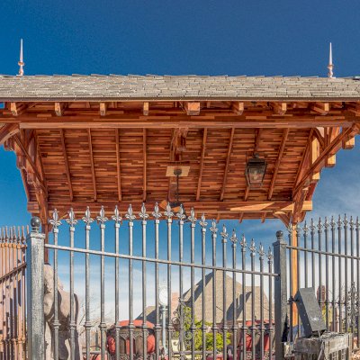 Custom Granada Pavilion (Options: 20 ft x 15 ft, Mosaic Redwood, 4-Post Anchor Kit for High-Wind, No Fascia Board, No Curtain Rods, 3 Ceiling Fan Bases, Transparent Premium Sealant). Shake from DaVinci Roof [https://www.davinciroofscapes.com/]. Photo Courtesy of K. Lowe of Newcastle, Oklahoma.