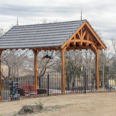 Custom Granada Pavilion (Options: 20 ft x 15 ft, Mosaic Redwood, 4-Post Anchor Kit for High-Wind, No Fascia Board, No Curtain Rods, 3 Ceiling Fan Bases, Transparent Premium Sealant). Shake from DaVinci Roof [https://www.davinciroofscapes.com/]. Photo Courtesy of K. Lowe of Newcastle, Oklahoma.