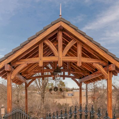 Custom Granada Pavilion (Options: 20 ft x 15 ft, Mosaic Redwood, 4-Post Anchor Kit for High-Wind, No Fascia Board, No Curtain Rods, 3 Ceiling Fan Bases, Transparent Premium Sealant). Shake from DaVinci Roof [https://www.davinciroofscapes.com/]. Photo Courtesy of K. Lowe of Newcastle, Oklahoma.