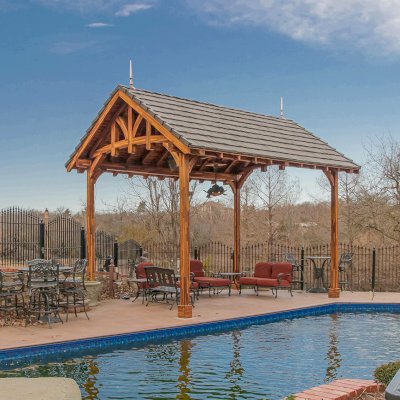 Custom Granada Pavilion (Options: 20 ft x 15 ft, Mosaic Redwood, 4-Post Anchor Kit for High-Wind, No Fascia Board, No Curtain Rods, 3 Ceiling Fan Bases, Transparent Premium Sealant). Shake from DaVinci Roof [https://www.davinciroofscapes.com/]. Photo Courtesy of K. Lowe of Newcastle, Oklahoma.
