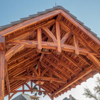 Custom Granada Pavilion (Options: 20 ft x 15 ft, Mosaic Redwood, 4-Post Anchor Kit for High-Wind, No Fascia Board, No Curtain Rods, 3 Ceiling Fan Bases, Transparent Premium Sealant). Shake from DaVinci Roof [https://www.davinciroofscapes.com/]. Photo Courtesy of K. Lowe of Newcastle, Oklahoma.