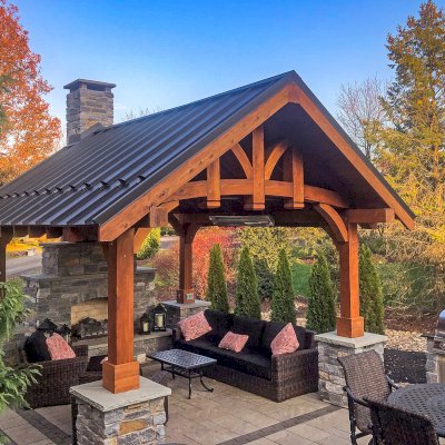 Granada Pavilion (Options: 8in x 8in post thickness, 17' L x 15' W, No Privacy Panels, Mature Redwood, No Fascia Board for Gutters, 9 ft Post Height, 4 Electrical Wiring Trims, No Post Decorative Trim, 4-Post Anchor Kit for High-Wind, 1 Ceiling Fan Base, No Curtain Rods, Transparent Premium Sealant). Photo Courtesy of D. Seed of Allentown, Pennsylvania