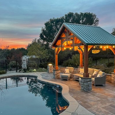 Custom Granada Pavilion (Options: 12’ L x 16’ W, California Redwood, 4-Post Anchor Kit for High Wind, Electrical Wiring Trim Kit for 1 Post, 1 Ceiling Fan Base, Transparent Premium Sealant), Photo Courtesy of S. Moore of Shingle Springs, California.