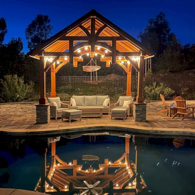 Custom Granada Pavilion (Options: 12’ L x 16’ W, California Redwood, 4-Post Anchor Kit for High Wind, Electrical Wiring Trim Kit for 1 Post, 1 Ceiling Fan Base, Transparent Premium Sealant), Photo Courtesy of S. Moore of Shingle Springs, California.