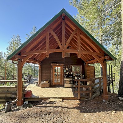 Custom Attached Granada Pavilion (Options: 10’ L x 18’ W, Mosaic Redwood, Increased Roof Pitch by Custom Request, Post Anchor Kit for High Wind, No Electrical Wiring Trim Kit, No Ceiling Fan Base, Coffee-Stain Premium Sealant).