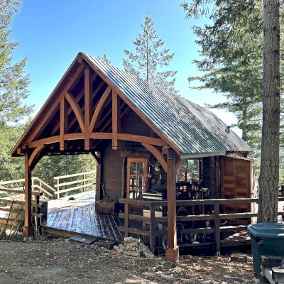 Custom Attached Granada Pavilion (Options: 10’ L x 18’ W, Mosaic Redwood, Increased Roof Pitch by Custom Request, Post Anchor Kit for High Wind, No Electrical Wiring Trim Kit, No Ceiling Fan Base, Coffee-Stain Premium Sealant).