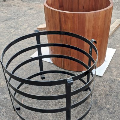 The Half Barrel Planter in Production (Options: 30" D x 28" H, Mature Redwood, No Growing Vegetables, Interior and Exterior of Box with Sealant [No Growing Vegetables], Transparent Premium Sealant). 