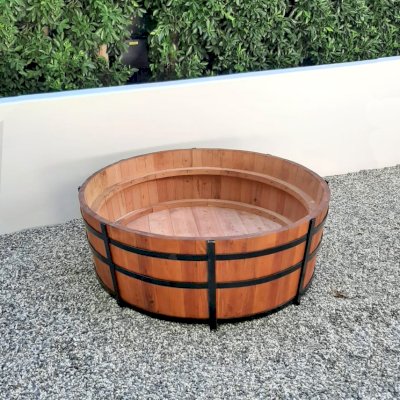 The Half Barrel Planters (Options: Custom Size - 48" D x 18" H, 2 Bands, Mature Redwood, Interior of Box without Sealant [Growing Vegetables], No Carrying Hooks on the Sides by Custom Request, Transparent Premium Sealant). Photo Courtesy of R. Newman of Los Angeles, California.