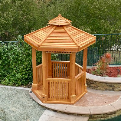 Hexagonal Retreat Pavilion (Options: Custom 7.5' Diameter, Add a Deck, Douglas-fir, 7' H Posts, 6-Post Anchor Kit for Concrete, With Upper and Lower Panels, Transparent Premium Sealant). Photo Courtesy of P. Redmond of Coto De Caza, CA. 