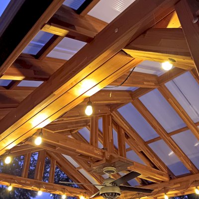 Illuminati Pavilion (Options: 15' L, 12' W, Mosaic Redwood, Unattached, Electrical Wiring Trim for 1 Post, 4-Post Anchor Kit for High-Wind, 1 Ceiling Fan Base, No Privacy Panels, No Curtain Rods, 9.5' Post Height, with Fascia Boards, Transparent Premium Sealant). Photo Courtesy of R. Pittenger of Troy, OH.